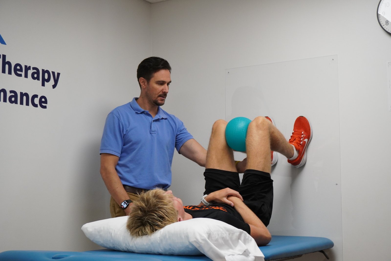 Dr. Van Nortwick teaching the 90-90 Hip Lift, a foundational PRI exercise, at Valley PT